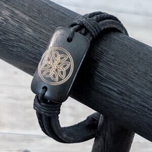 Tie Bracelet with Celtic Like Charm - Leather?